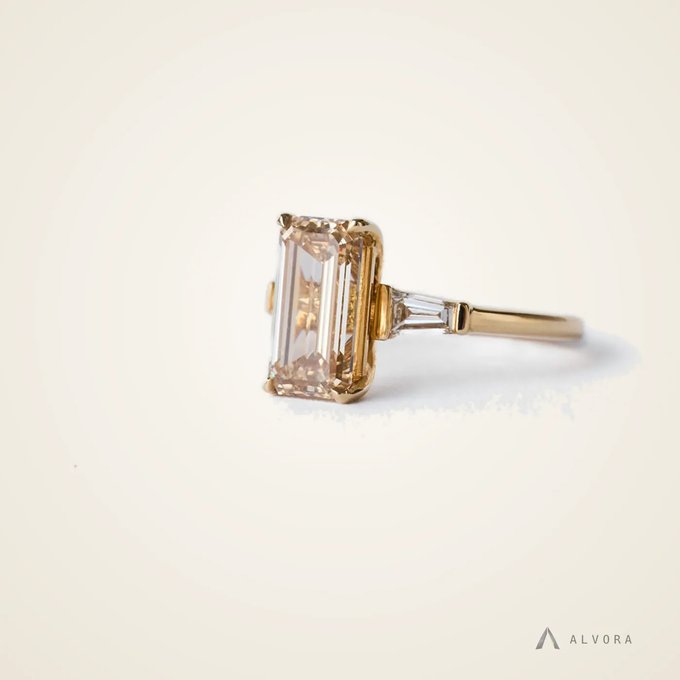Amandine Champagne Emerald Three Stone, emerald three stone lab-grown diamond engagement ring
