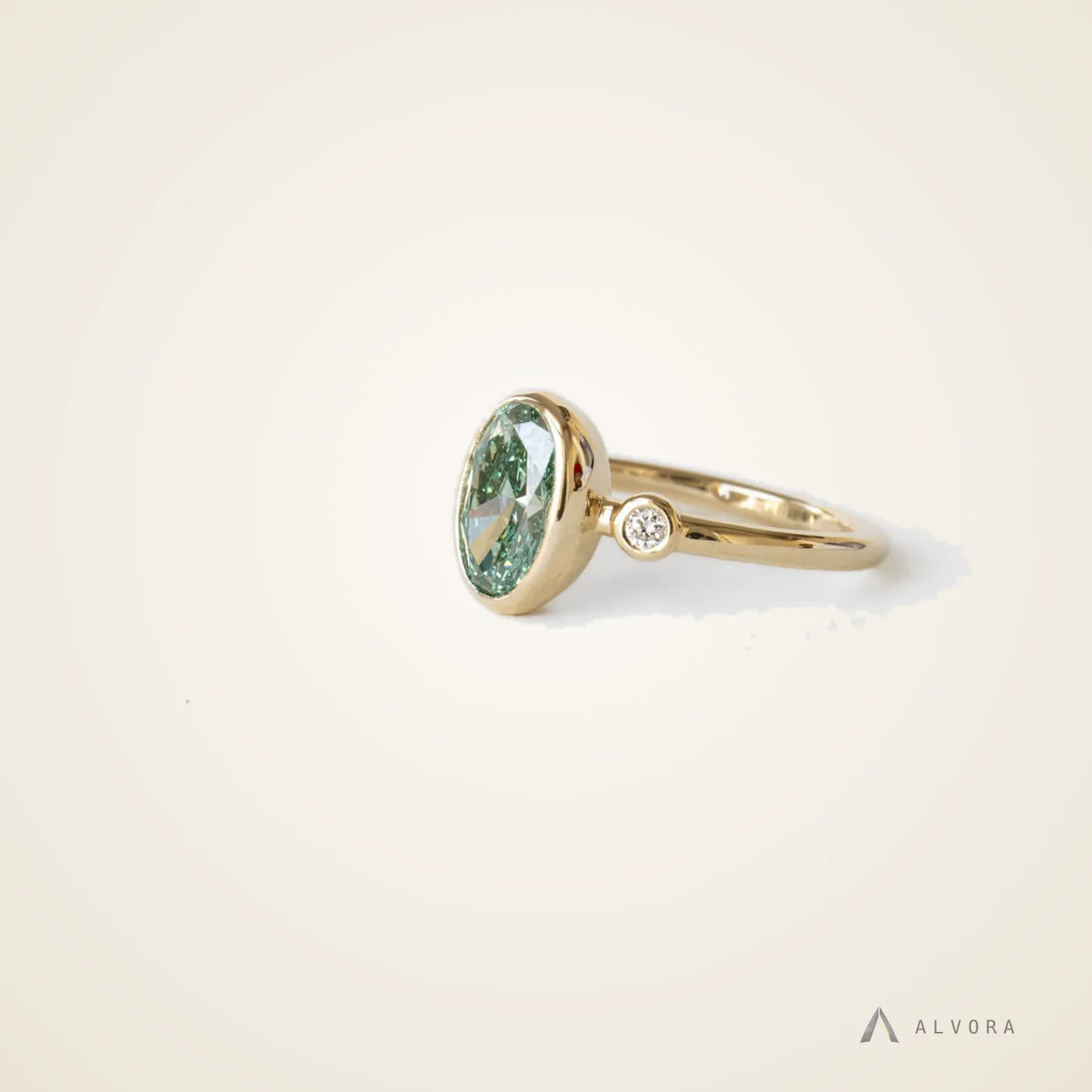 Ione Green Oval Solitaire, oval solitaire lab-grown diamond engagement ring